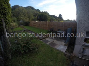 Garden with patio & furniture & fire-pit (fish-eye lens)