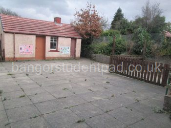 Patio and shed (large lawn off photo raised up on the right)